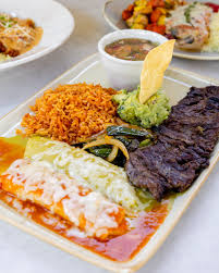 Toro Mexican Bistro signature dishes Duck Carnitas TacosShort Rib EnchiladasScallop AguachileMezcal Cocktails